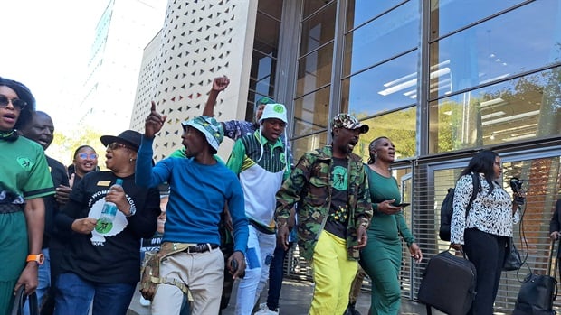 <p>MKP members chant outside of the court following a ruling by the Constitutional Court. The members say they will continue to get guidance from party leader Jacob Zuma. </p><p><em>Picture: Thahasello Mphatsoe/News24</em></p>