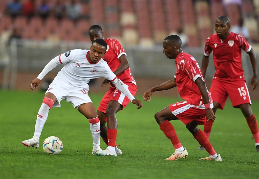 POLOKWANE, SOUTH AFRICA - APRIL 20: Siphesihle Maduna of Cape Town Spurs and Nyiko Mobbie of Sekhukhune United during the DStv Premiership match between Sekhukhune United and Cape Town Spurs at Peter Mokaba Stadium on April 20, 2024 in Polokwane, South Africa. (Photo by Philip Maeta/Gallo Images)