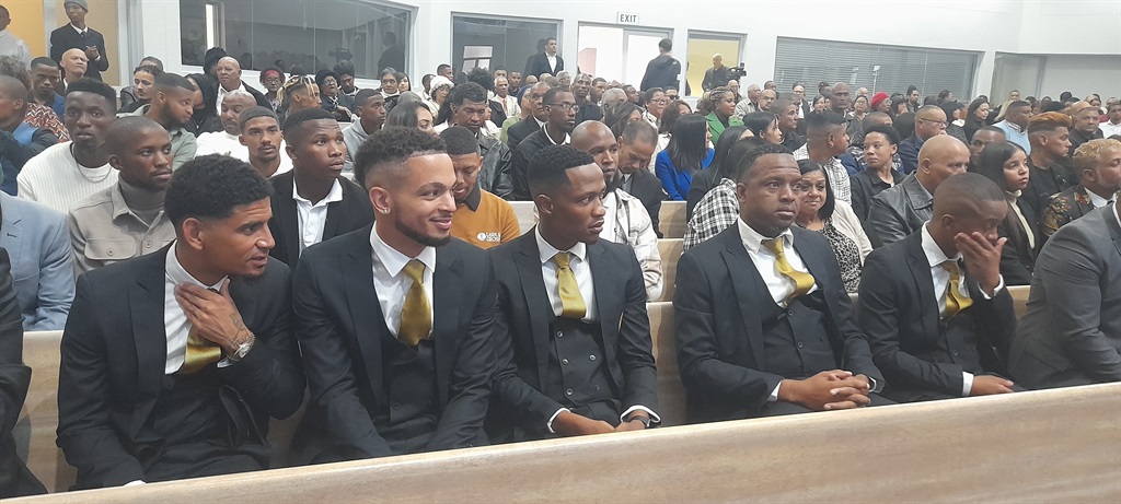 Soccer players at the funeral of the late Luke Luk