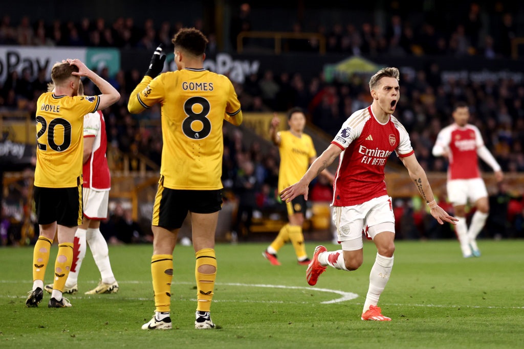 WOLVERHAMPTON, ENGLAND - APRIL 20: Leandro Trossard of Arsenal celebrates scoring his teams first goal during the Premier League match between Wolverhampton Wanderers and Arsenal FC at Molineux on April 20, 2024 in Wolverhampton, England. (Photo by Naomi Baker/Getty Images)