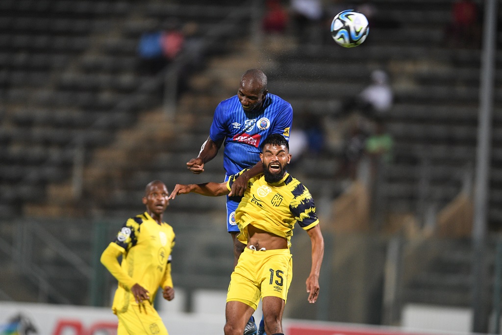 PRETORIA, SOUTH AFRICA - FEBRUARY 20:    Keanu Cupido of Cape Town City and Etiosa Ighodaro of SuperSport United during the Nedbank Cup, Last 32 match between SuperSport United and Cape Town City FC at Lucas Moripe Stadium on February 20, 2024 in Pretoria, South Africa. (Photo by Lefty Shivambu/Gallo Images)
