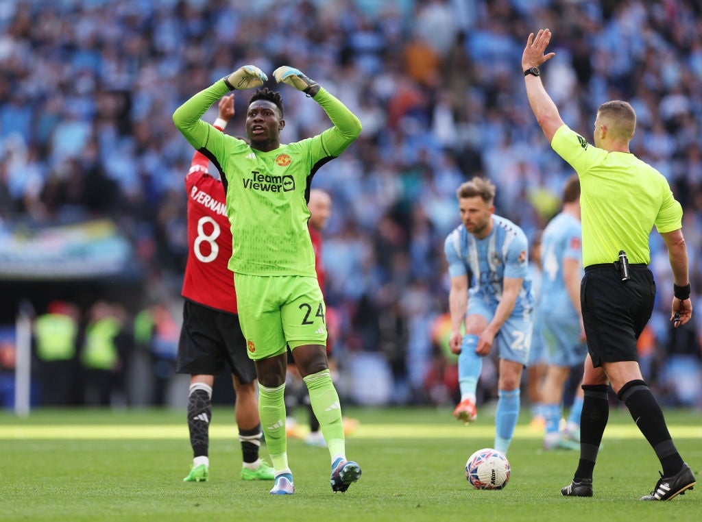 LONDON, ENGLAND - APRIL 21: Referee Robert Jones disallows a goal by Victor Torp of Coventry City (not pictured) after a VAR check as Andre Onana of Manchester United reacts during the Emirates FA Cup Semi Final match between Coventry City and Manchester United at Wembley Stadium on April 21, 2024 in London, England. (Photo by Richard Heathcote/Getty Images)