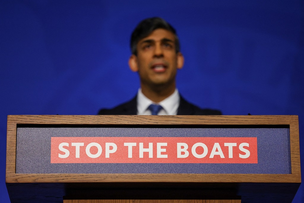 British Prime Minister Rishi Sunak at a press conference on Monday, speaking on  the treaty with Rwanda to transfer migrants. (Toby Melville / POOL / AFP)