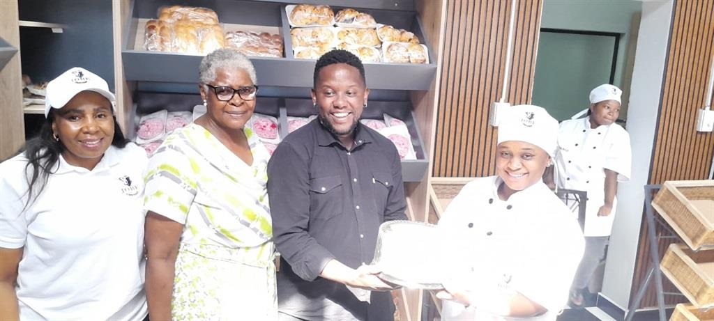 Local artist Sbu Dludlu (in a black shirt) attended the opening of the confectionery in Duduza, Ekurhuleni, with him from left to right: Simphiwe Sithole, Nompi Sithole and Lindokuhle Zondi. Photo by Happy Mnguni