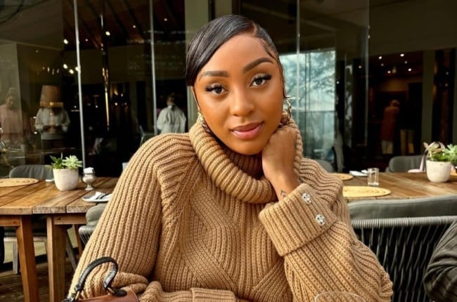 Nadia Nakai looking stunning in a knitted turtleneck. 