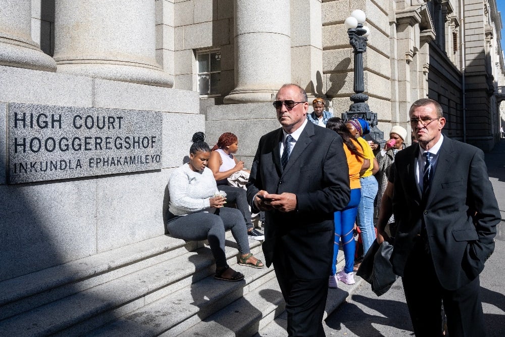 Andre Naude and Ukrainian citizen Igor Russol (right) are seen outside the Western Cape High Court in Cape Town. (Jaco Marais/Gallo Images/Die Burger)