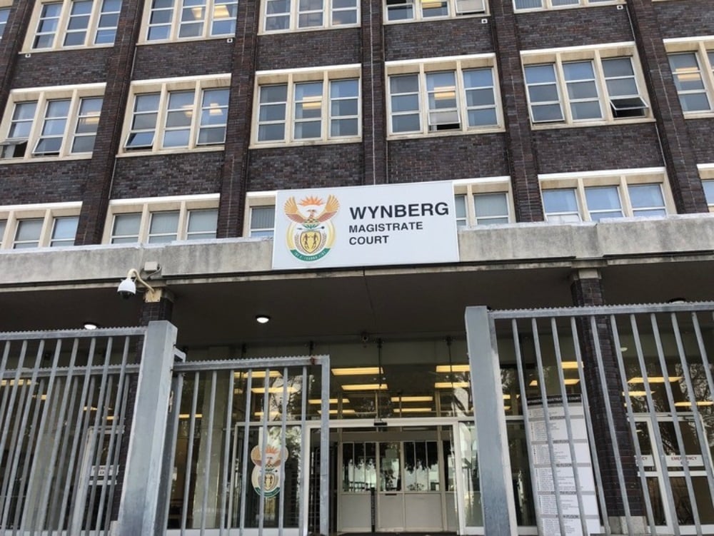 Three SAPS members appeared in the Wynberg Magistrate's Court on Tuesday on charges of torture. (Mary-Anne Gontsana/GroundUp)