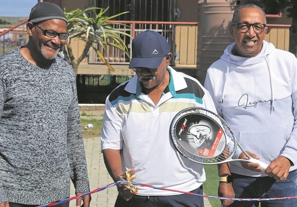 Marking the official launch of the Bloemendal Hub, Clifton Swartz (left), Cedric Matroos (middle), and Brian Witbooi (right) cut the ribbon. 