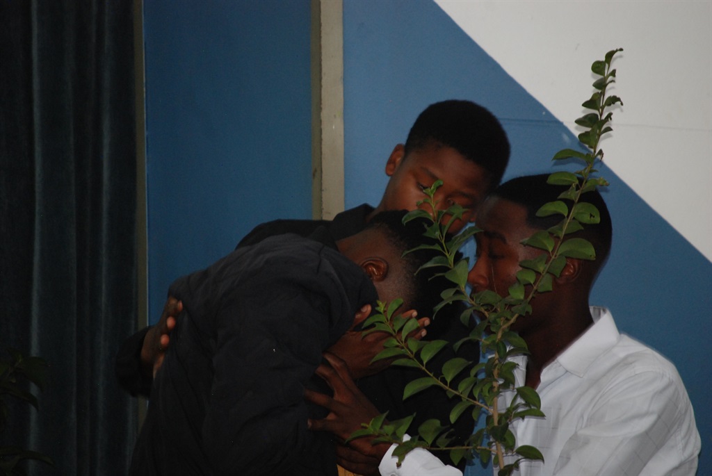 Fellow pupils break down during the funeral service at Rabasotho Community Centre in Thembisa. Photo by Khaya Masipa