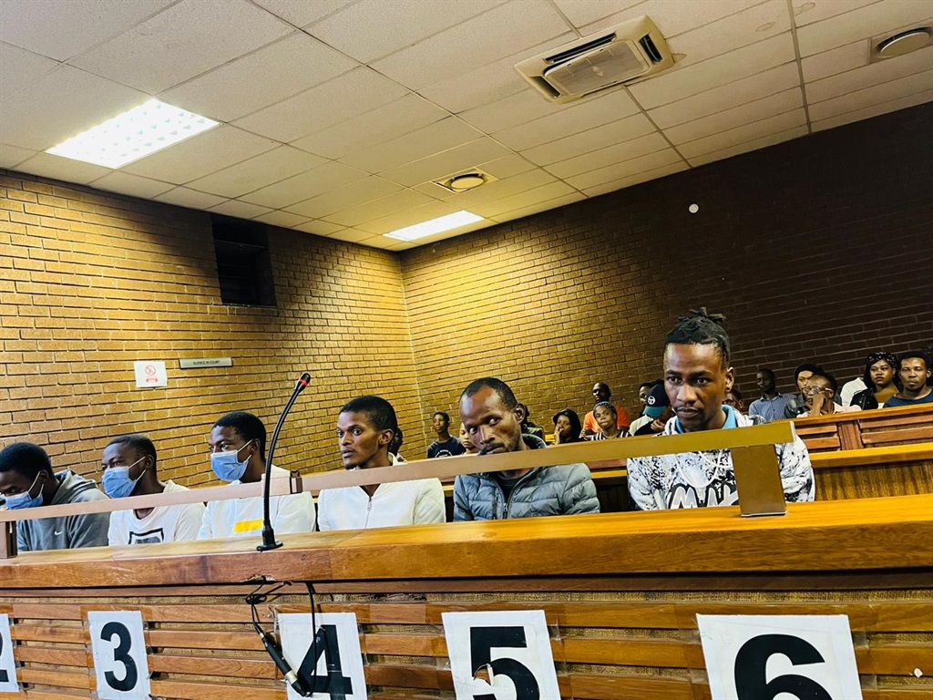 The six suspects alleged of killing Kaizer Chiefs defender Luke Fleurs made a brief appearance in the Roodepoort Magistrate Court. photo by Phuti Mathobela.