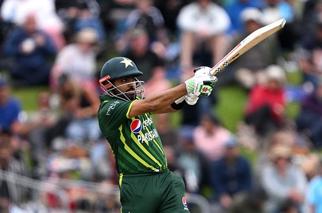 Pakistan top-order batter and captain Babar Azam pulls a shot in a T20I. (Joe Allison/Getty Images)