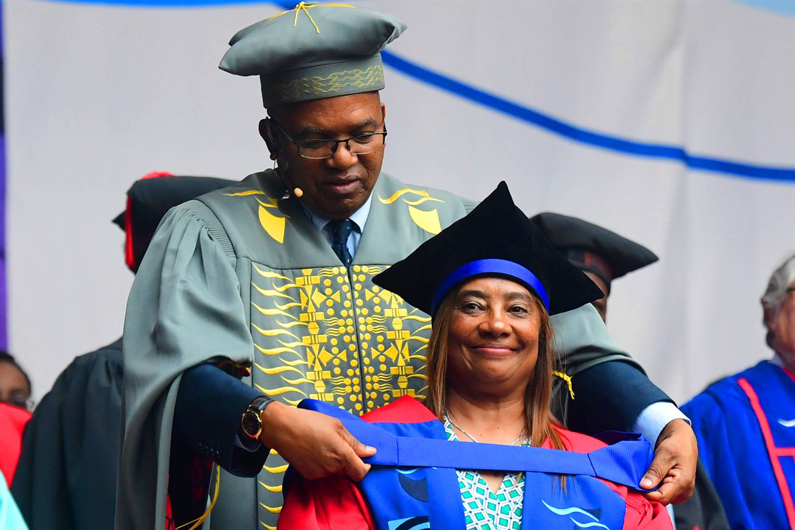 Prof. Chris Nhlapo, vice-chancellor of the CPUT, puts the ribbon of the honorary doctorate around the neck of Banyana Banyana's head coach, Desiree Ellis. (Theo Jephta)