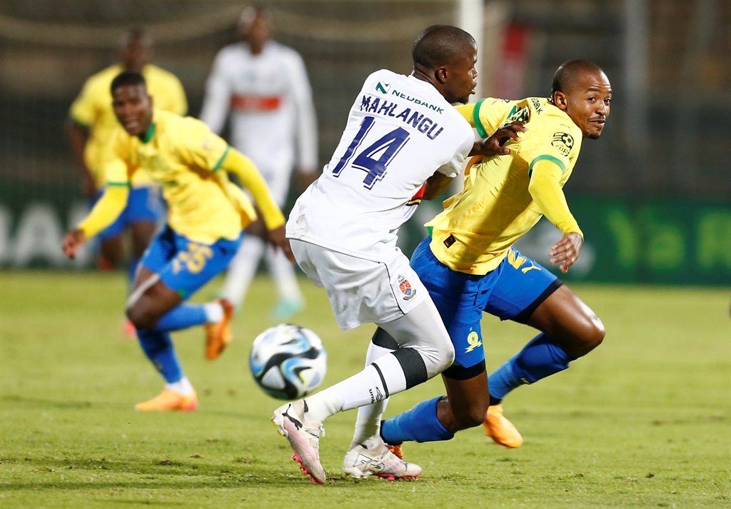 PRETORIA, SOUTH AFRICA - APRIL 12: Thapelo Morena of Mamelodi Sundowns in action with Tshepiso Mahlangu of University of Pretoria during the Nedbank Cup, Quarter Final match between University of Pretoria and Mamelodi Sundowns at Lucas Moripe Stadium on April 12, 2024 in Pretoria, South Africa. (Photo by Gallo Images)