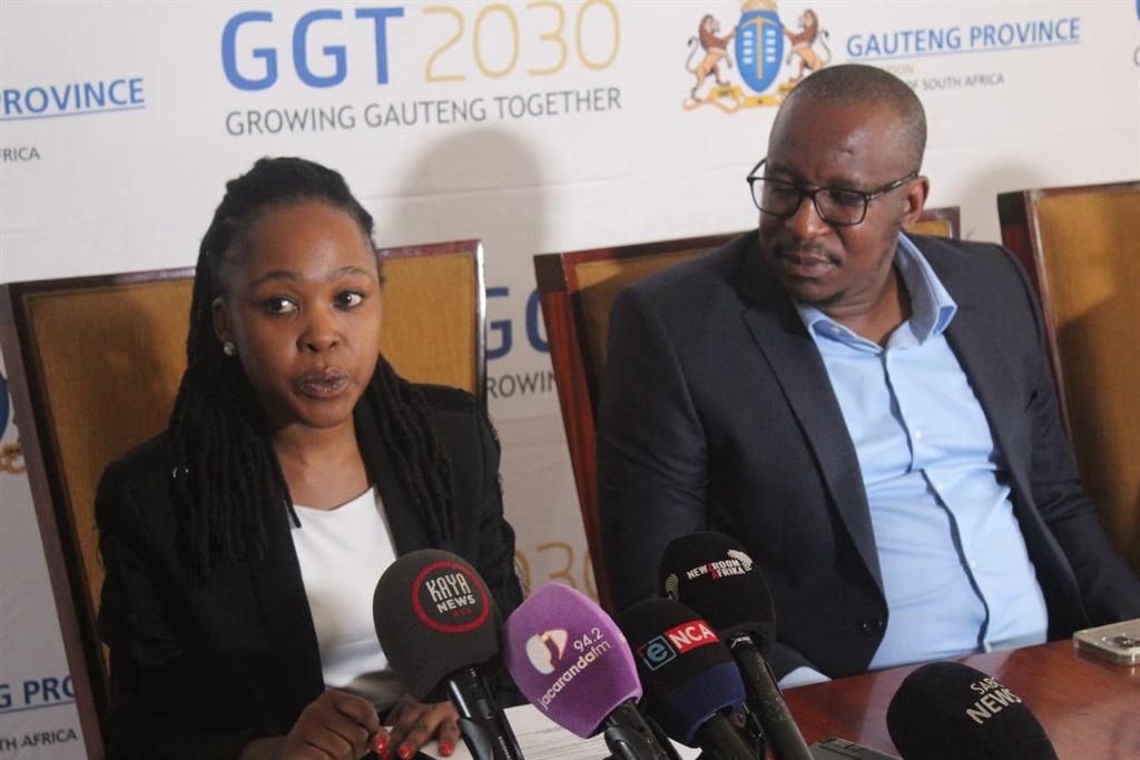 Thembekile Graham, leading investigator for Seanego Attorneys, with Gauteng Education MEC Matome Chiloane during a media briefing at Daveyton Skills school. 