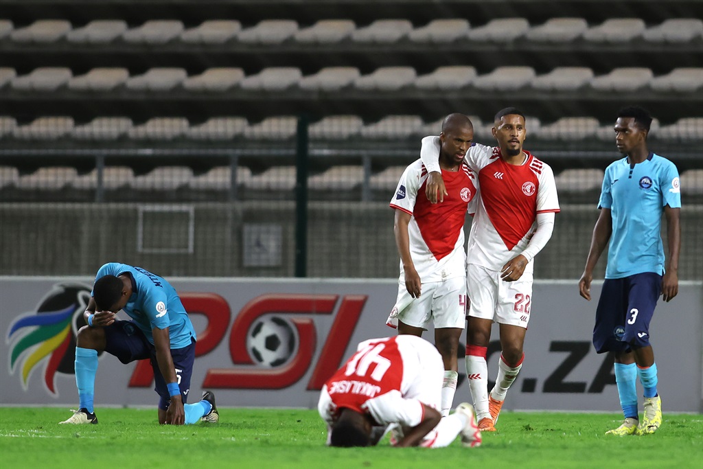 Tshepo Gumede and Therlo Moosa of Cape Town Spurs celebrate beating Richards Bay 1-0 during the DStv Premiership match at Athlone Stadium. (Shaun Roy/Gallo Images)