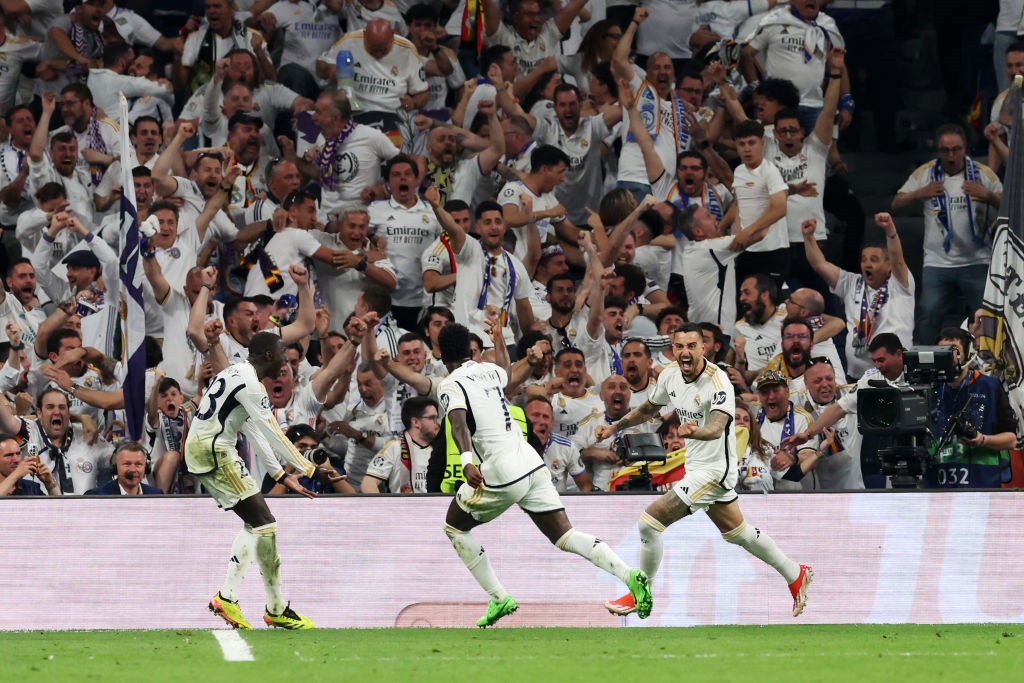 MADRID, SPAIN - MAY 08: Joselu of Real Madrid celebrates scoring his teams first goal during the UEFA Champions League semi-final second leg match between Real Madrid and FC Bayern MÃ¼nchen at Estadio Santiago Bernabeu on May 08, 2024 in Madrid, Spain. (Photo by Alexander Hassenstein/Getty Images)