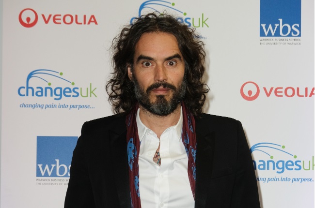 English actor Russell Brand claims to be a changed man after being baptised.  (PHOTO: Gallo Images/Getty Images) 