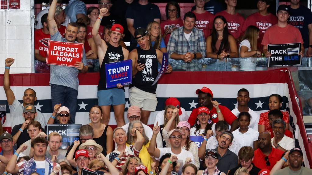 Attendees cheer during a rally for former US presi