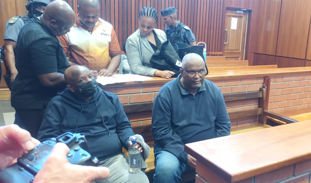University of Fort Hare accused Isaac Plaatjies and Terrence Joubert (seated) at the Alice Magistrate's Court on Thursday. (Sithandiwe Velaphi/News24)