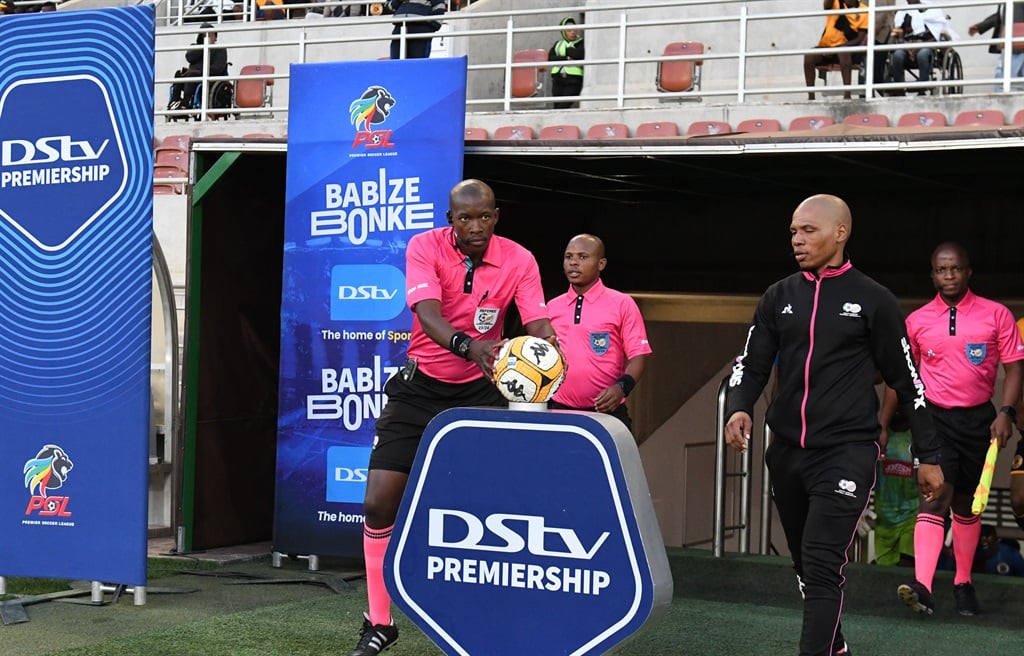 POLOKWANE, SOUTH AFRICA - APRIL 27: Match officials walk out prior to the DStv Premiership match between Kaizer Chiefs and  SuperSport United at Peter Mokaba Stadium on April 27, 2024 in Polokwane, South Africa. (Photo by Philip Maeta/Gallo Images)
