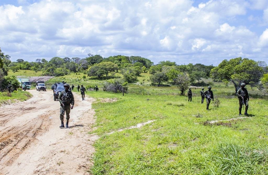 Rwandan Counter-Terrorism Special Units and Mozambique police patrol streets in the town of Palma as Rwanda provided military assistance after the militant group Ansar al-Sunna seized critical locations in the region rich in natural gas and valuable metals, in Palma, Cabo Delgado Province, Mozambique on December 18, 2023. Nearly 4 thousand people have lost their lives since 2017 in the attacks of the terrorist organization Ansar al-Sunna against civilians. Hundreds of thousands of people have been displaced due to the attacks. (Cyrile Ndegeya/Anadolu via Getty Images)
