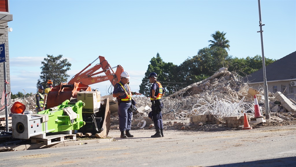 Emergency workers are still searching for unaccounted people following the building collapse in Victoria street, George. (Alfonso Nqunjana/News24)