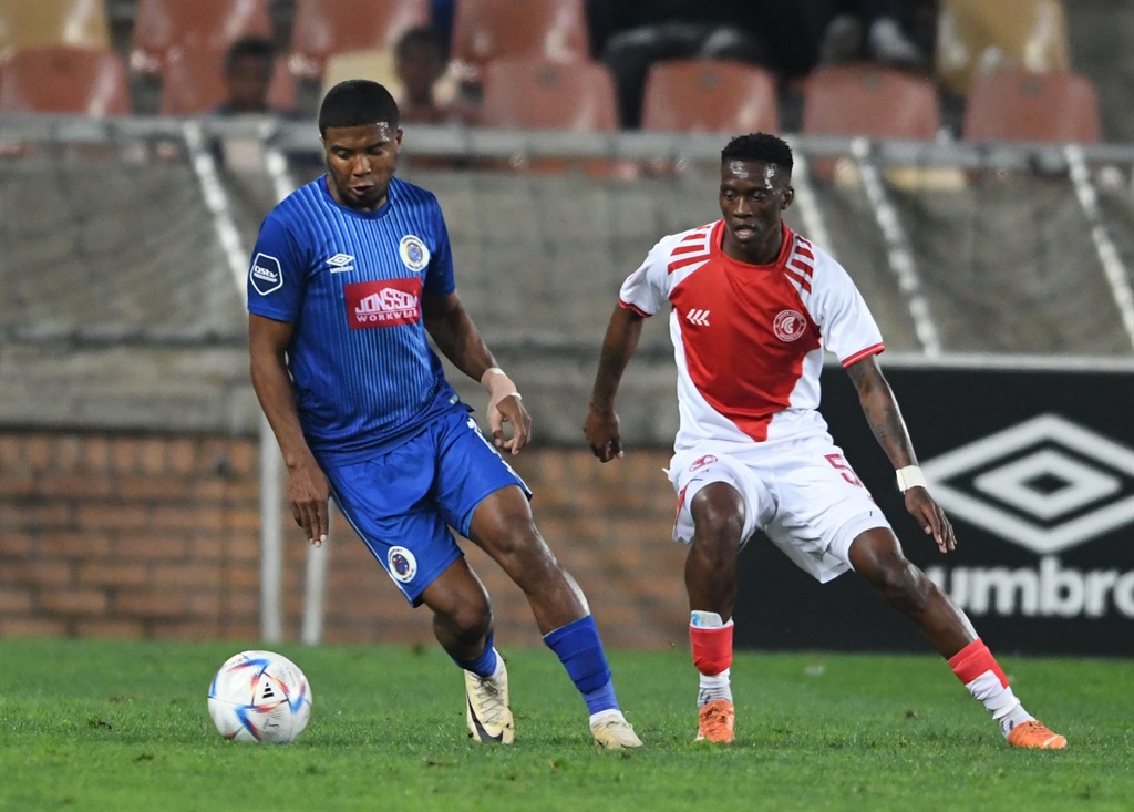 POLOKWANE, SOUTH AFRICA - MAY 10: Lyle Lakay of SuperSport United and Katleho Maphathe of Cape Town Spurs during the DStv Premiership match between SuperSport United and Cape Town Spurs at Peter Mokaba Stadium on May 10, 2024 in Polokwane, South Africa. (Photo by Philip Maeta/Gallo Images)