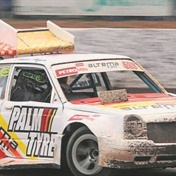 Track racer burns rubber to top