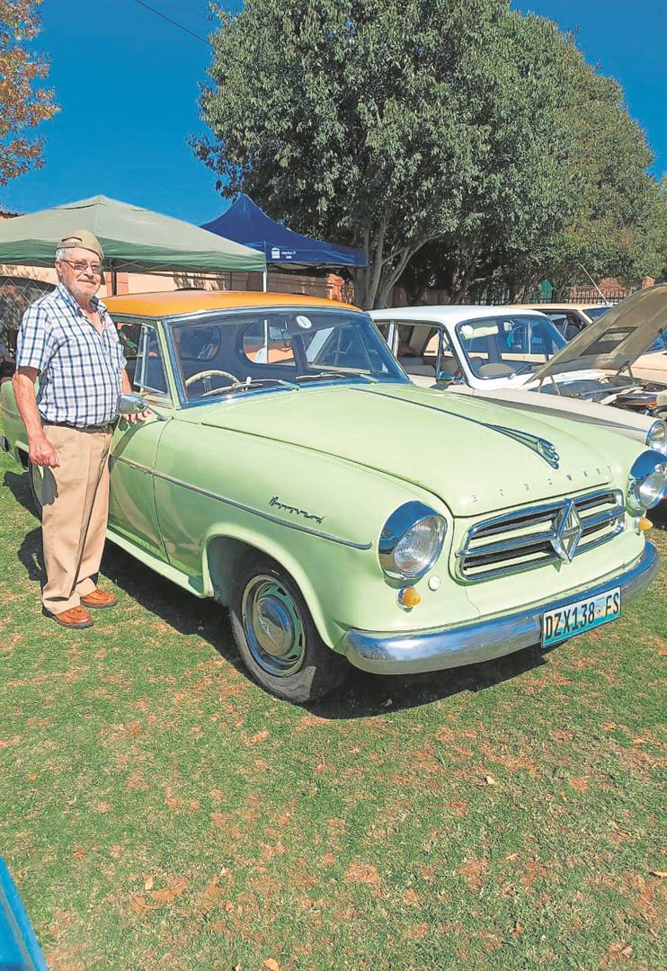 Buks Joubert, a member of the Classic Car Club, stands beside his 1959 Borgward Isabella at the NG Moedergemeente bazaar in Riebeeckstad on 1 May. Photo: Avrille Coetzee