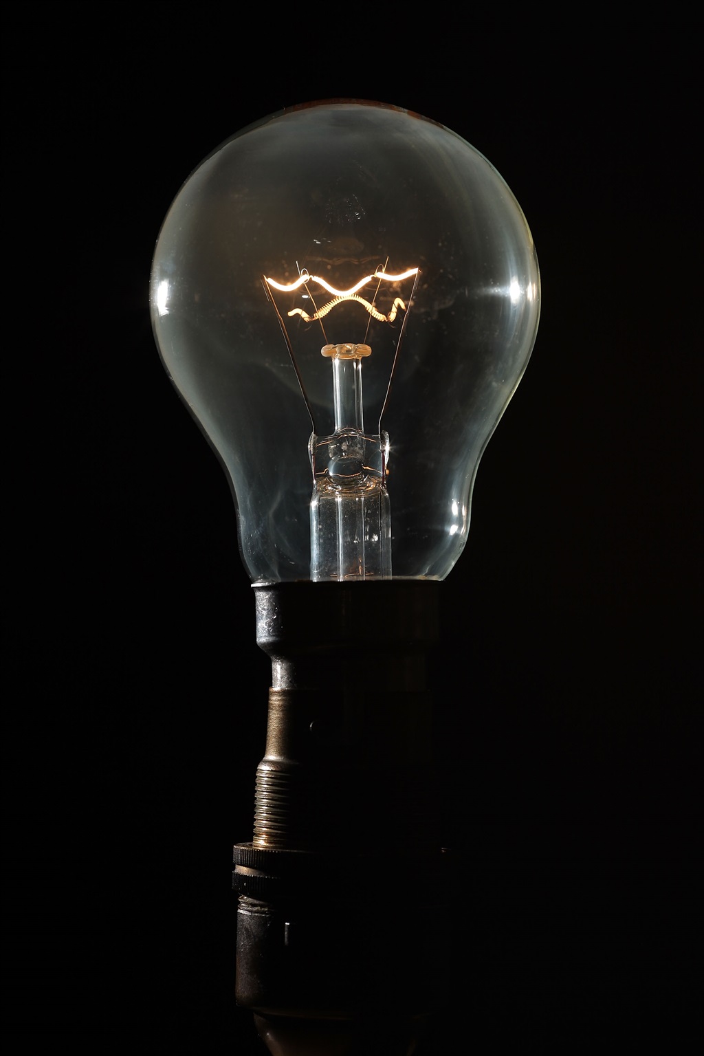 Energy saving light bulb, Eco homes in Chewton Men