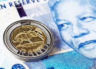 Rand holds firm despite NHI bill as cooler US inflation saps dollar 