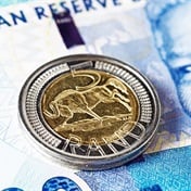 Rand holds firm despite NHI bill as cooler US inflation saps dollar 