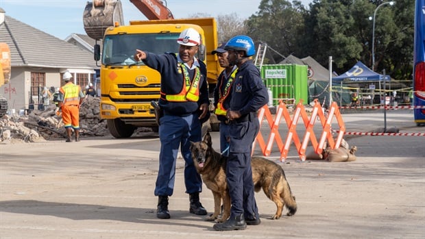 <p>A K9 unit and the bomb squad are on the scene ahead of President Cyril Ramaphosa's visit to the George collapsed site.&nbsp;</p><p><em>Photo by: Alfonso Nqunjana/News24</em></p>