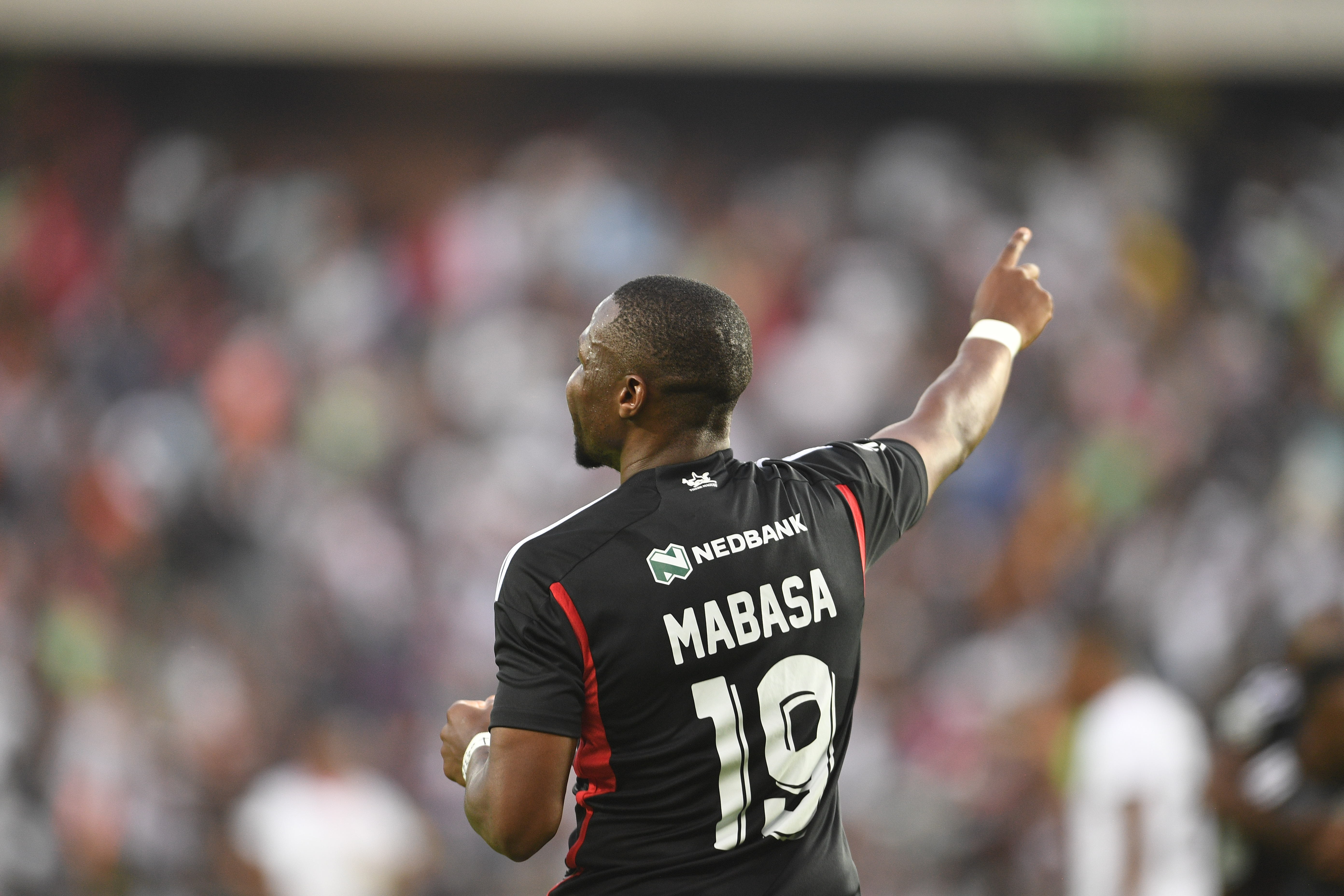 Former Bafana striker Patrick Mayo believes Broos erred in not selecting Pirates' red-hot Mabasa