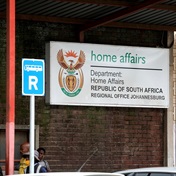Home Affairs minister ordered to pay refugee R300 000 following unlawful arrest 