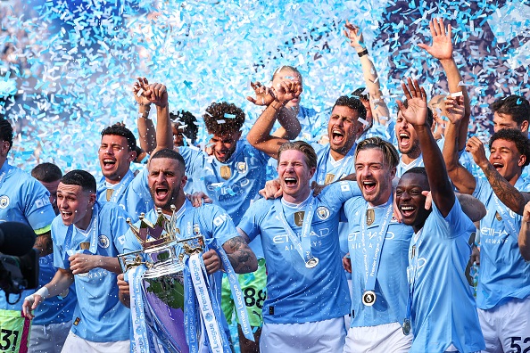 Manchester City were crowned Premier League champions for a record fourth time in a row.