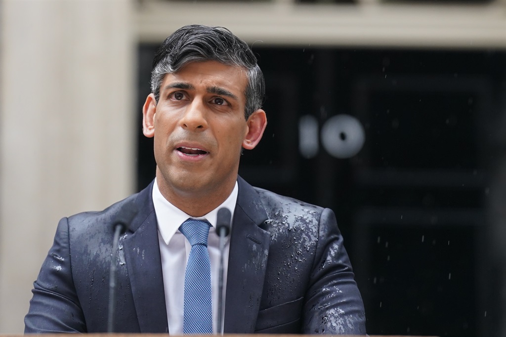 A somewhat damp UK Prime Minister Rishi Sunak outside 10 Downing Street, London, after calling a General Election for 4 July. (Stefan Rousseau/PA Images via Getty Images)