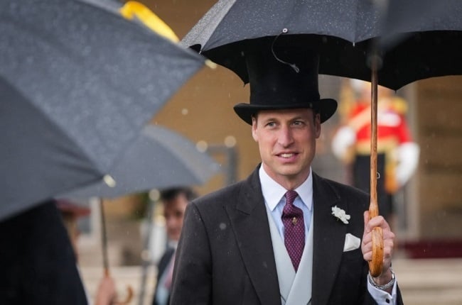 Prince William hosts a rainy garden party at Buckingham Palace with his royal cousins