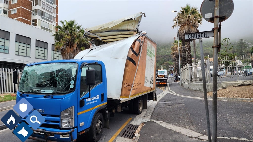 News24 | Boxed in: Man arrested after hijacked delivery vehicle collides with Muizenberg bridge