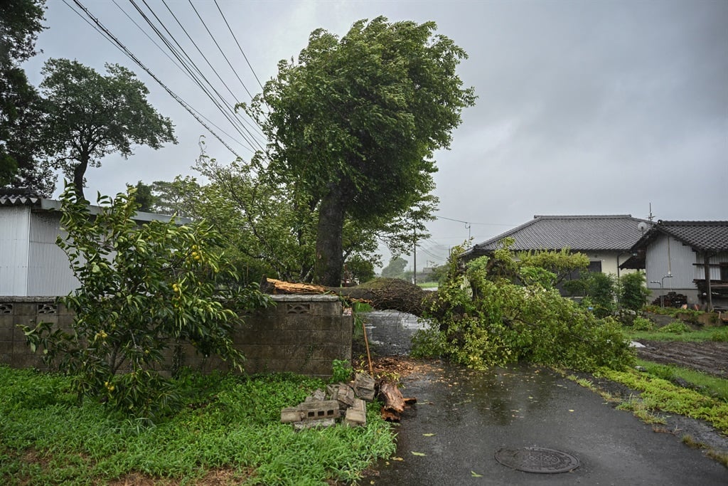 Typhoon Shanshan hit Japan with full force on 29 August 2024 injuring dozens as howling winds smashed windows and blew tiles off houses while torrential rains turned rivers into raging torrents. (Yuichi Yamazaki / AFP)