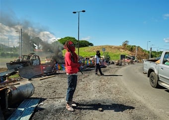 Police officer detained after shooting dead protester in New Caledonia. Riot death toll rises to 7