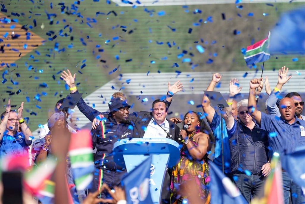 Steenhuisen on stage addressing crowd of supporter