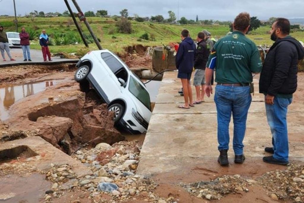 Inayet Mohammed was driving when the road he was on collapsed. His white VW T-Cross vehicle landed in a ditch filled with water.
