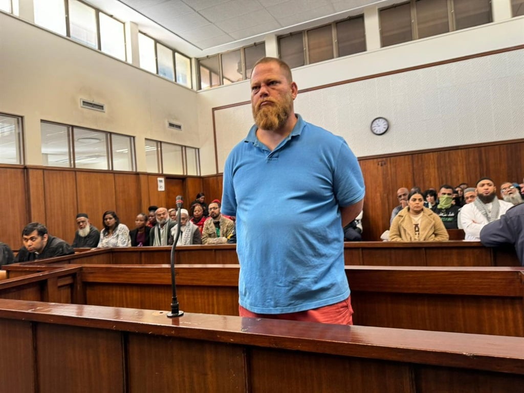 Bearded man in blue t-shirt appears in court dock