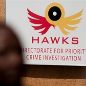 Hawks arrest five people in murder, drug dealing investigation