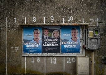 France's far-right National Rally projected to win snap election but without absolute majority