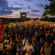 France's far-right National Rally projected to win snap election but without absolute majority