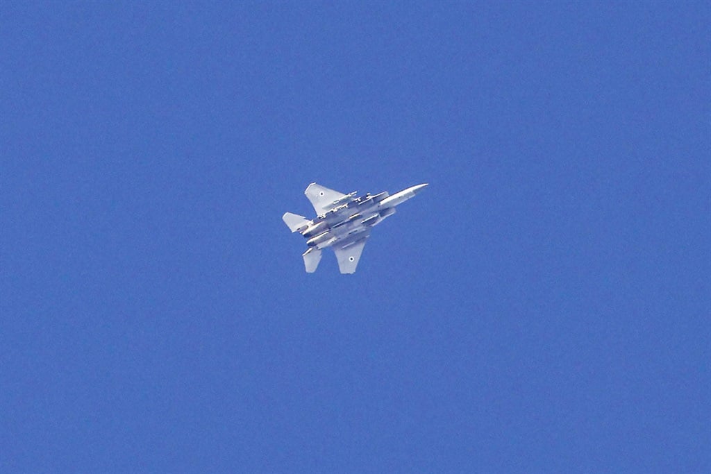 An Israeli F-15 jet fighter flies above the border area with the Gaza Strip in southern Israel on 17 November 2023 amid the ongoing battles between Israel and the Palestinian militant group Hamas. (Jack Guez/AFP)