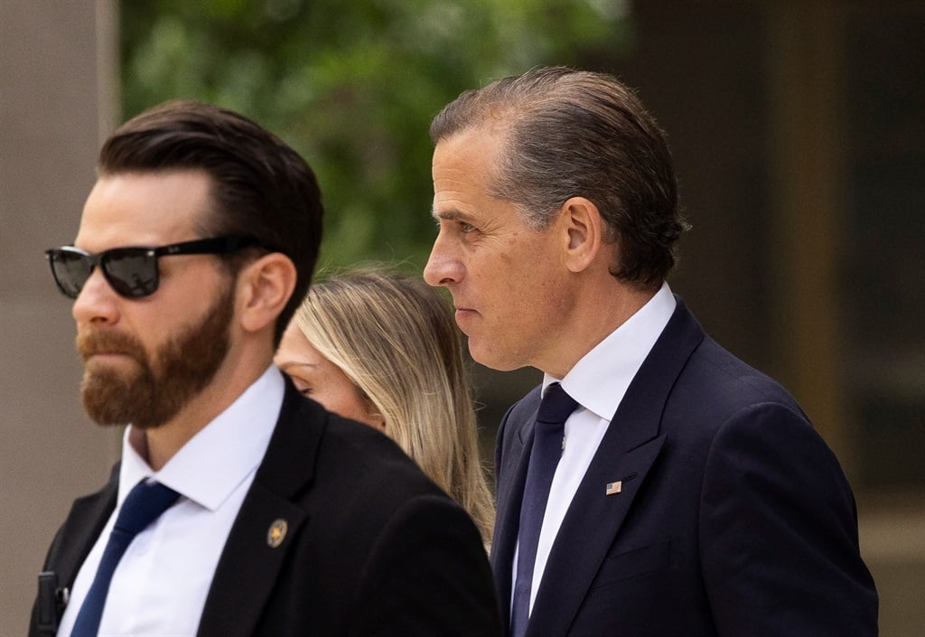 Hunter Biden (R), son of US President Joe Biden, leaves the J. Caleb Boggs Federal Building in Wilmington, Delaware, on 11 June 2024. (RYAN COLLERD / AFP)