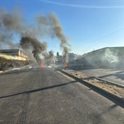 Angry Alexandra residents block roads, burn tyres over extended power outages in cold weather